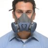view from the front of a man wearing reusable half-face respirator mask