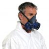 man shows how to wear blue and black half-face reusable respirator mask