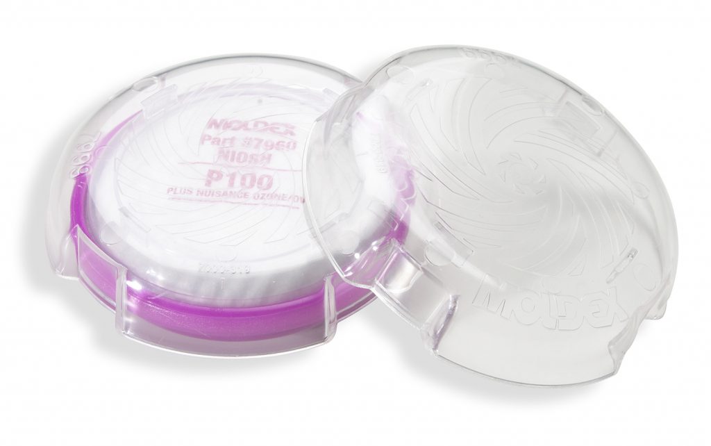 pink and white cartridge filter that goes with reusable respirator face masks